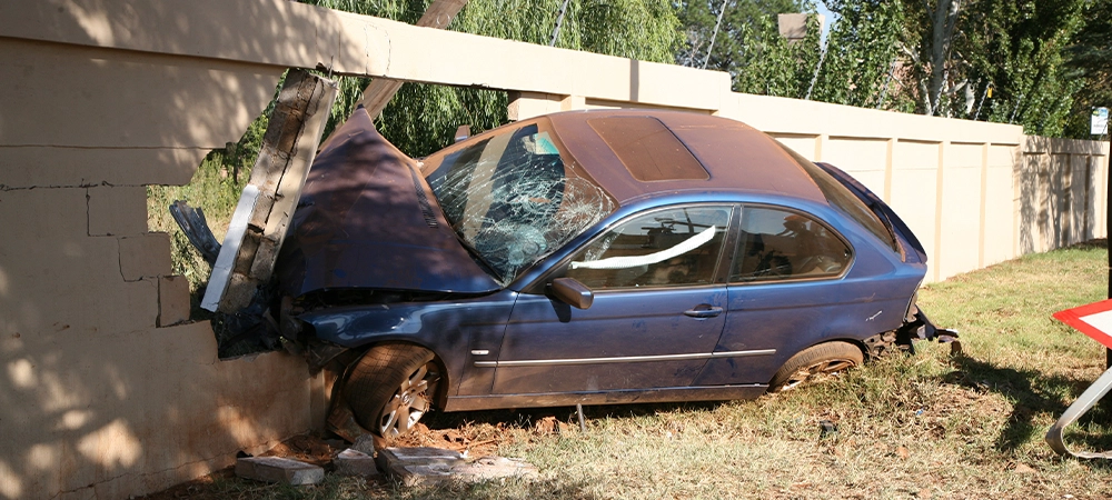 car accident damaged the home property wall